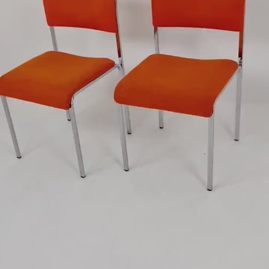 Set of 2 orange girsberger eurochairs, space age design 1970s