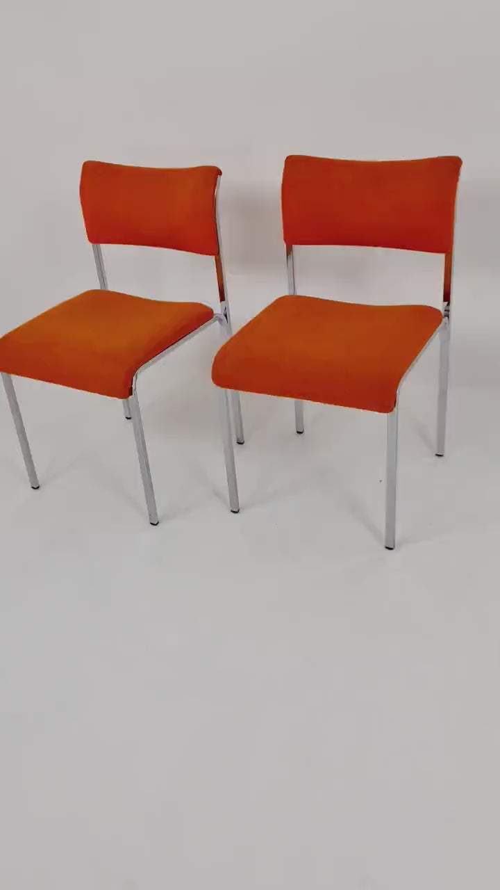 Set of 2 orange girsberger eurochairs, space age design 1970s