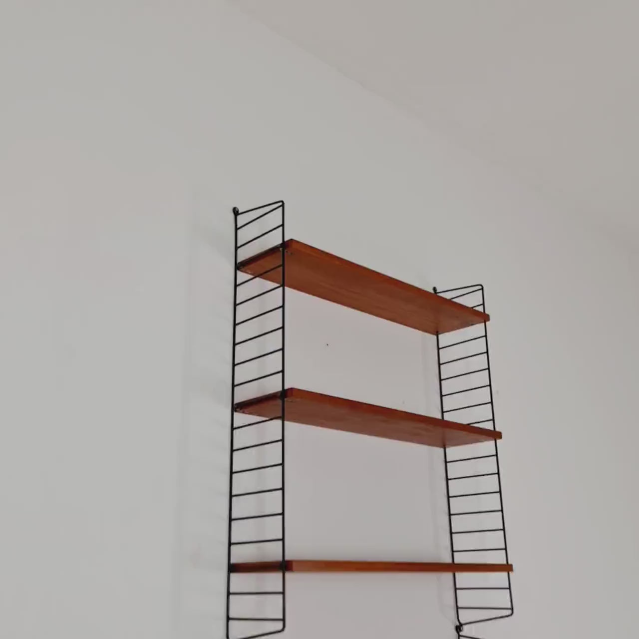 Wall-mounted original Swedish string shelf-system, bookcase teak wood by Nils & Kajsa Strinning, 1960s