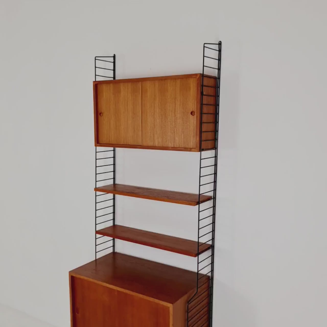 Wall-mounted original Swedish string shelf-system, drawers, bookcase teak wood by Nils & Kajsa Strinning, 1960s